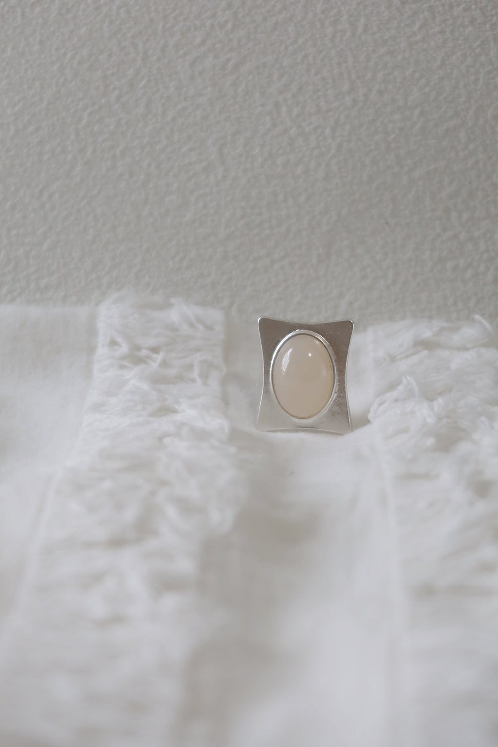 The Pavilion White – Geometric Sterling Silver Ring with Oval White Stone