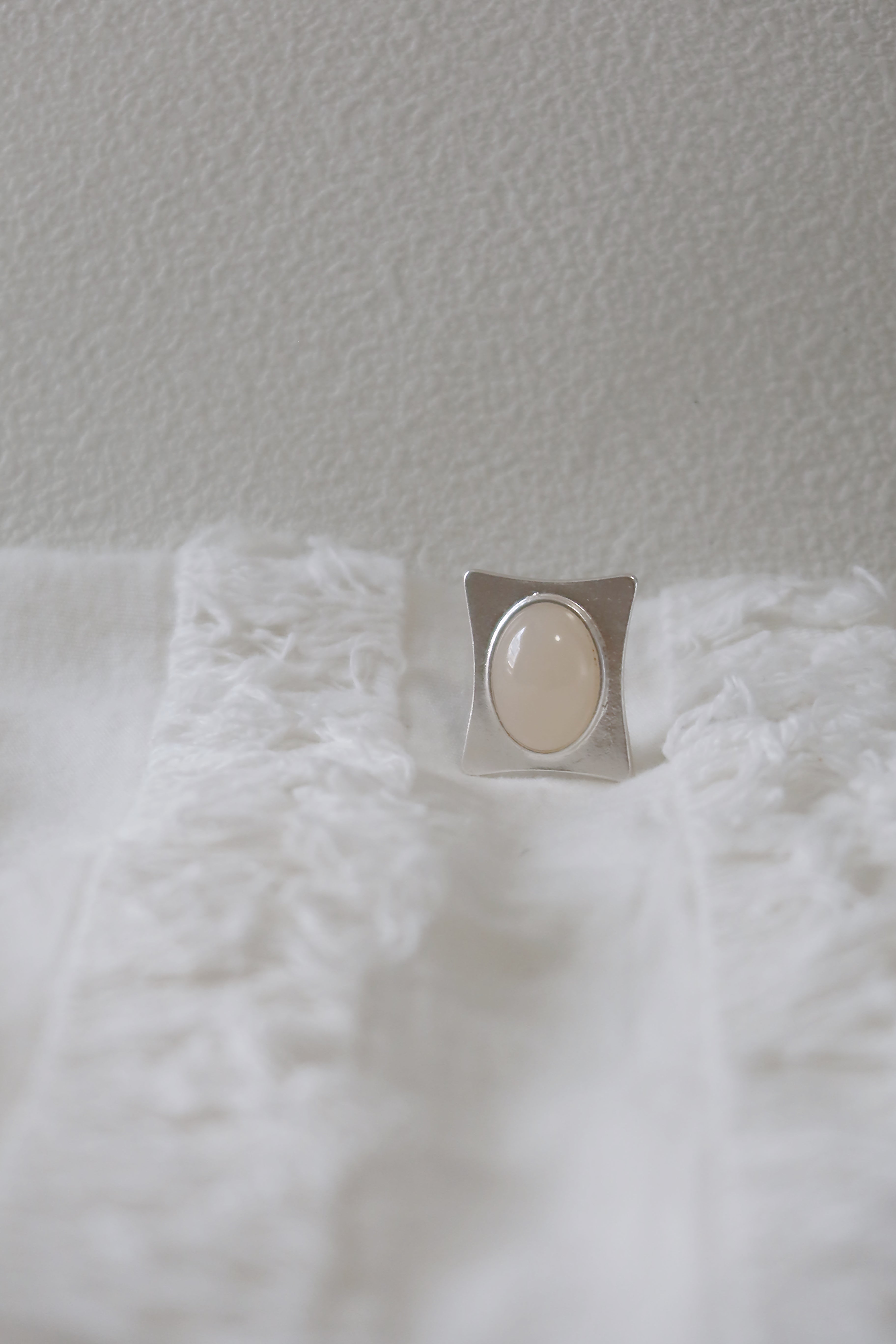 The Pavilion White – Geometric Sterling Silver Ring with Oval White Stone