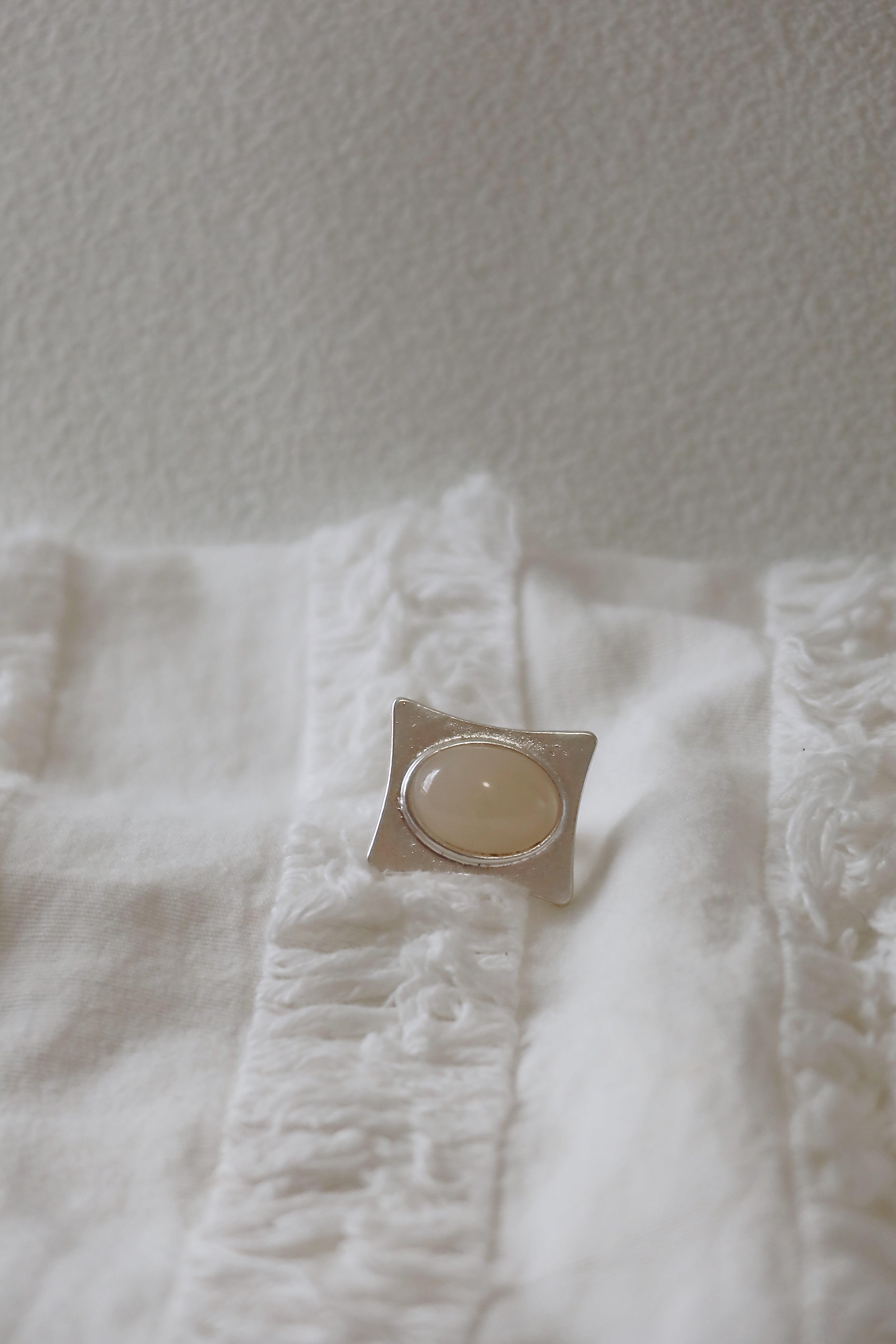 The Pavilion White – Geometric Sterling Silver Ring with Oval White Stone