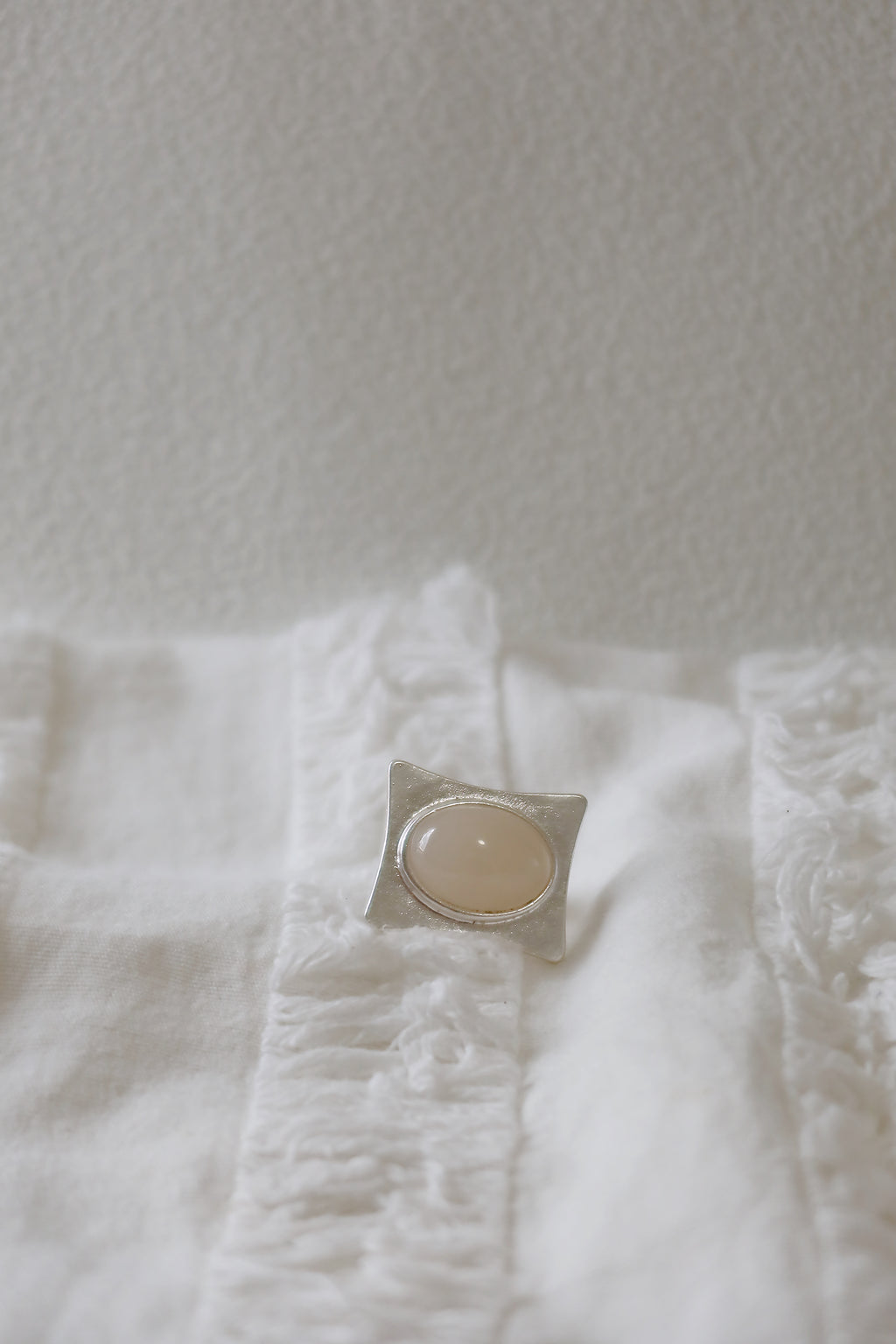 The Pavilion White – Geometric Sterling Silver Ring with Oval White Stone