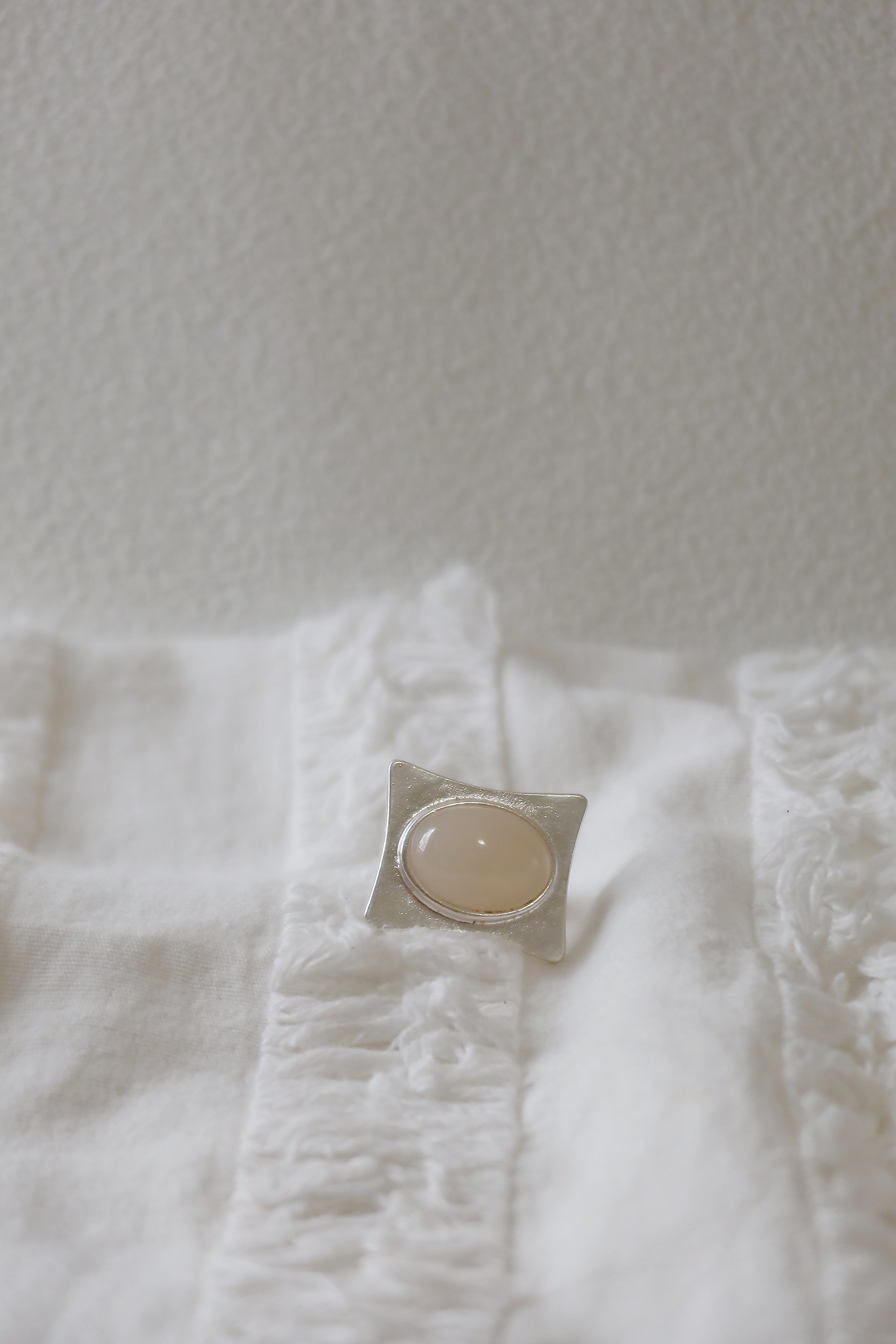 The Pavilion White – Geometric Sterling Silver Ring with Oval White Stone