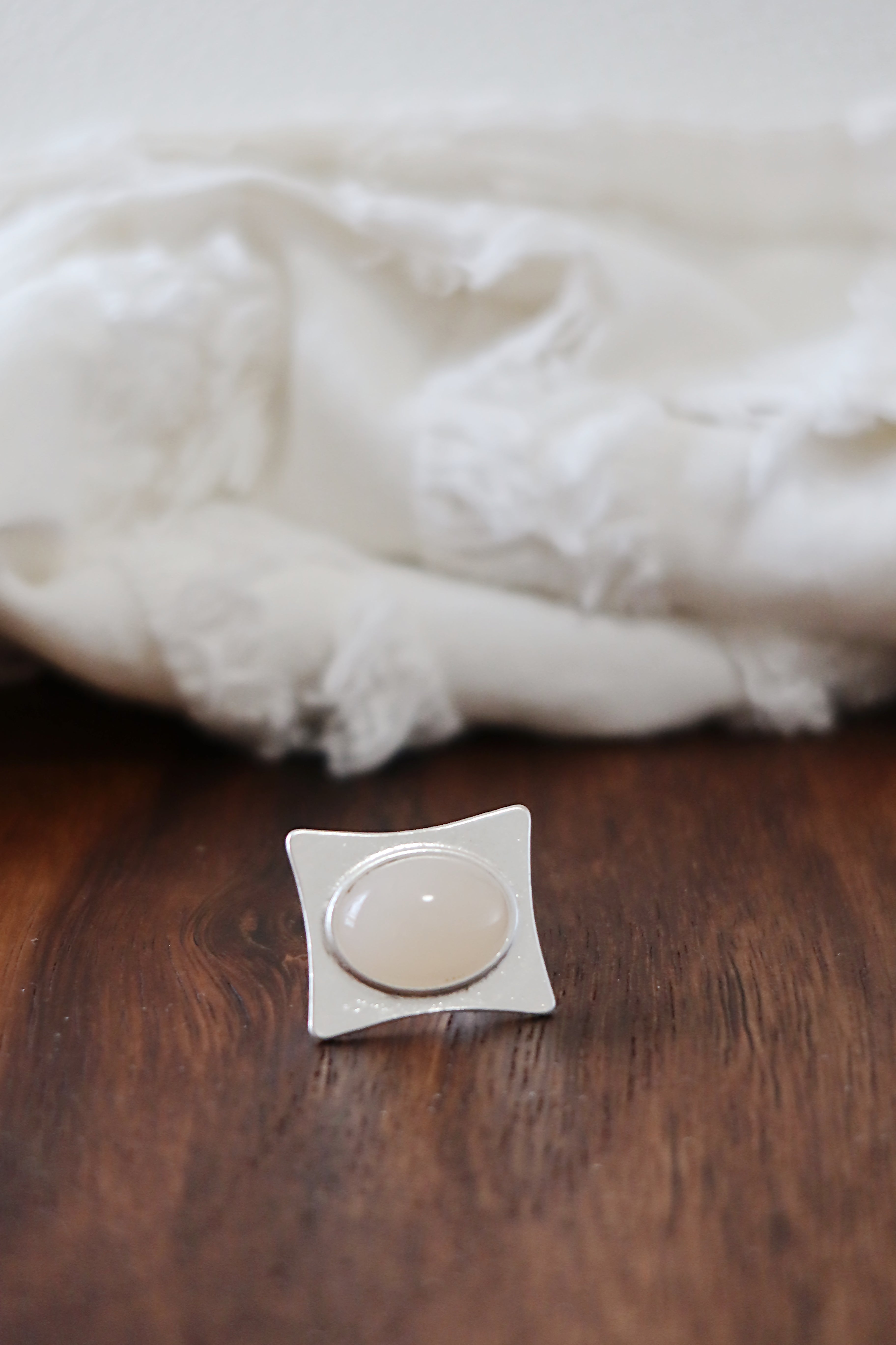 The Pavilion White – Geometric Sterling Silver Ring with Oval White Stone