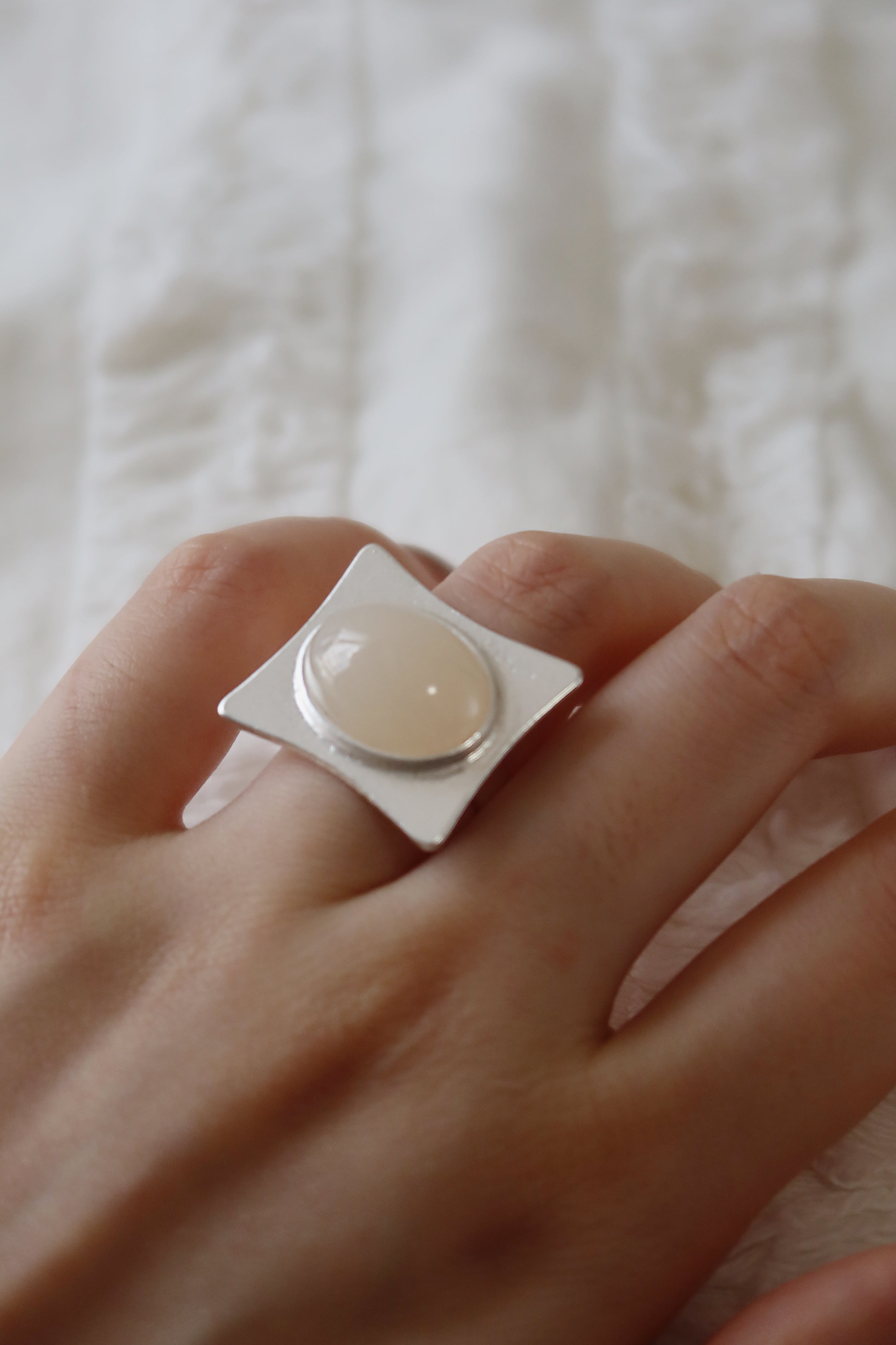 The Pavilion White – Geometric Sterling Silver Ring with Oval White Stone