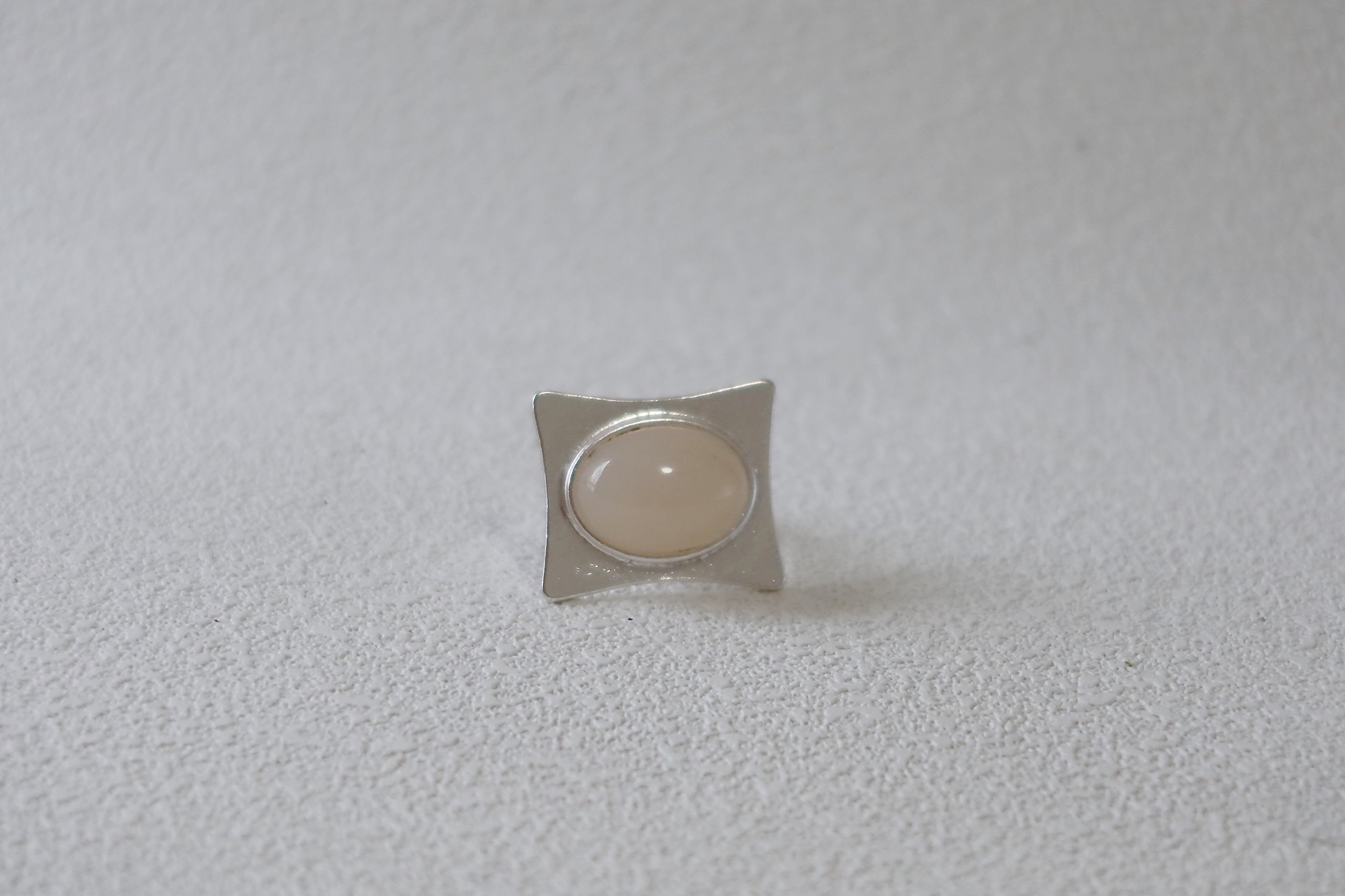 The Pavilion White – Geometric Sterling Silver Ring with Oval White Stone