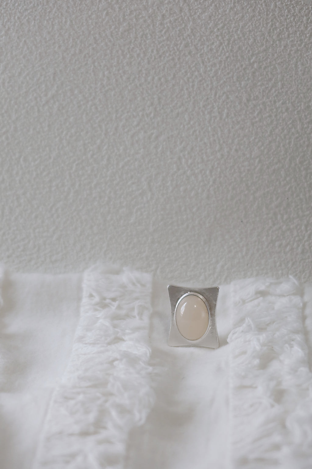 The Pavilion White – Geometric Sterling Silver Ring with Oval White Stone