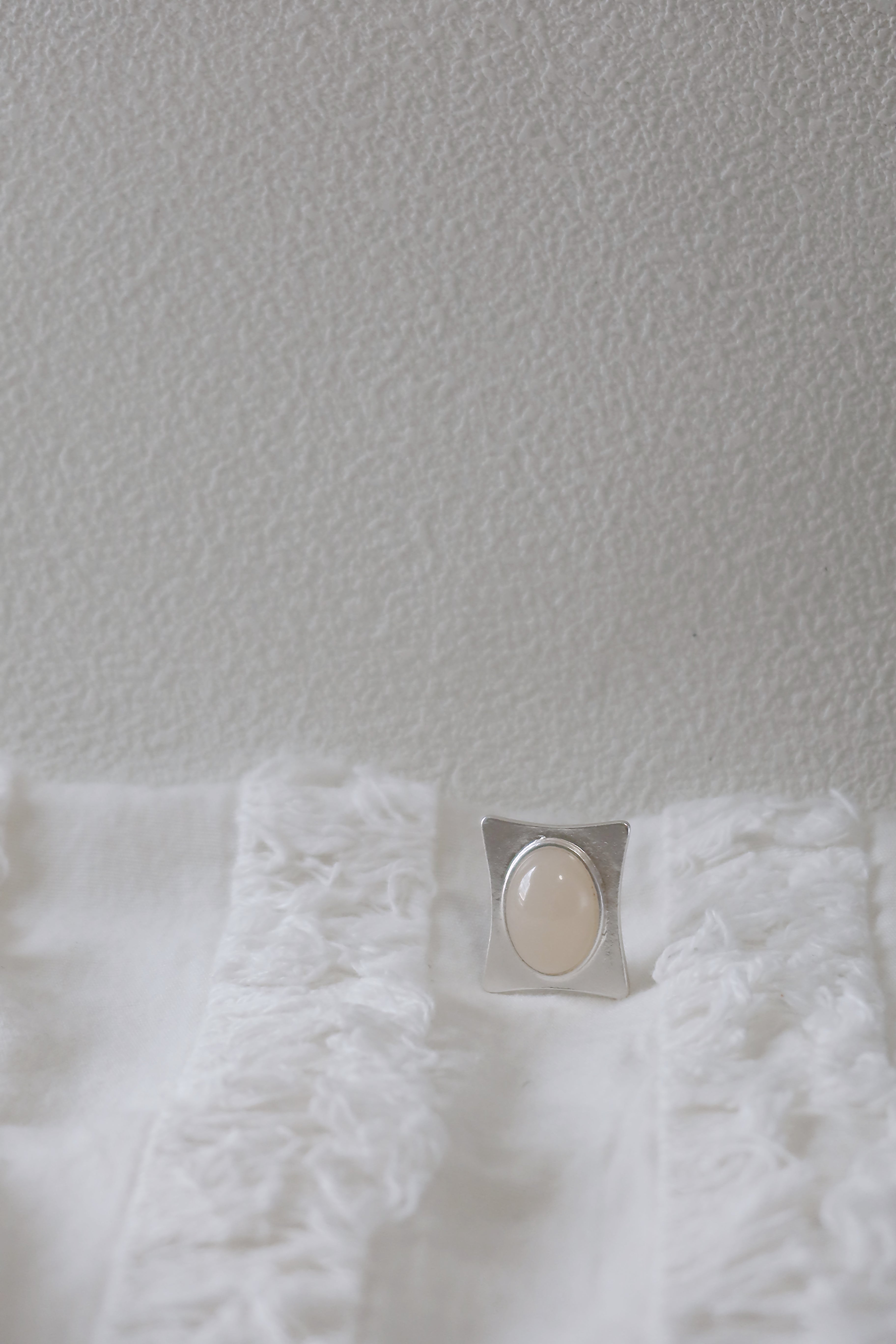 The Pavilion White – Geometric Sterling Silver Ring with Oval White Stone