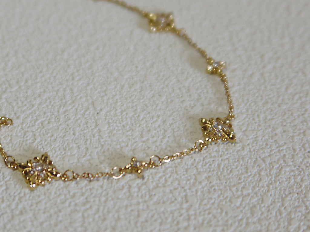 The Golden Iris – Delicate Charm Bracelet in 18K Gold Plated Eco Brass
